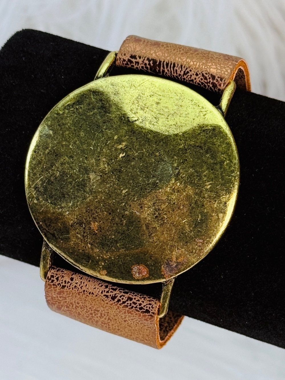 Aged goldtone, hammered faux brown leather bracelet